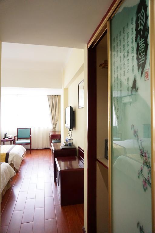 Guangdong Oversea Chinese Hotel Guangzhou Rum bild