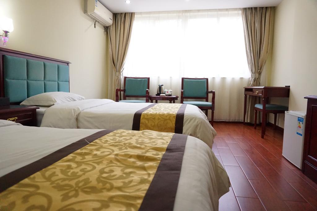 Guangdong Oversea Chinese Hotel Guangzhou Rum bild