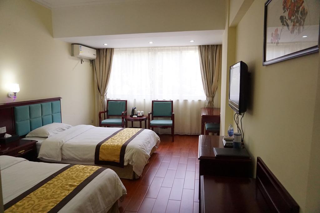 Guangdong Oversea Chinese Hotel Guangzhou Rum bild