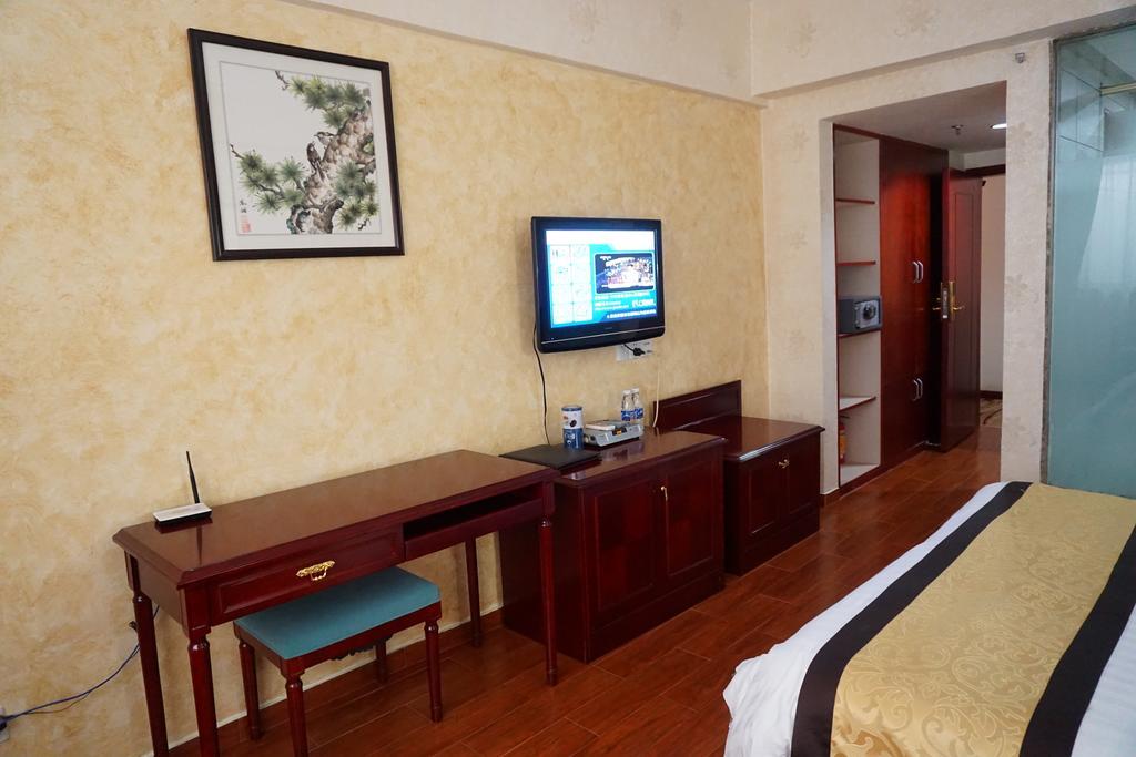 Guangdong Oversea Chinese Hotel Guangzhou Rum bild