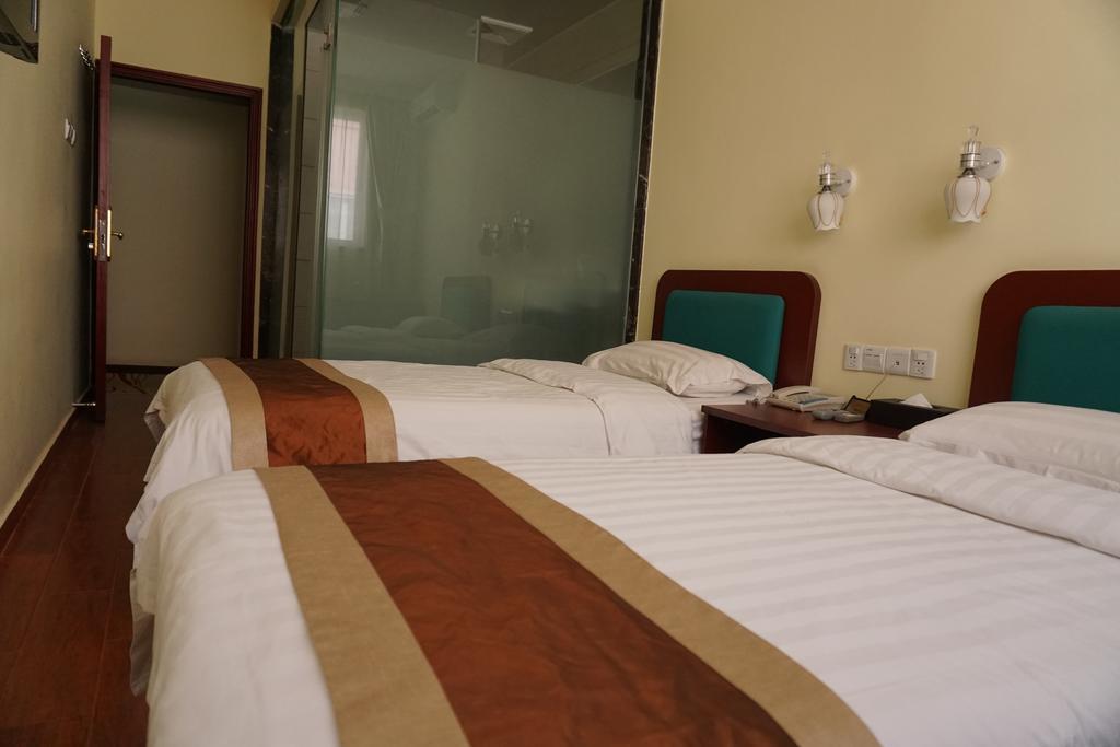 Guangdong Oversea Chinese Hotel Guangzhou Rum bild