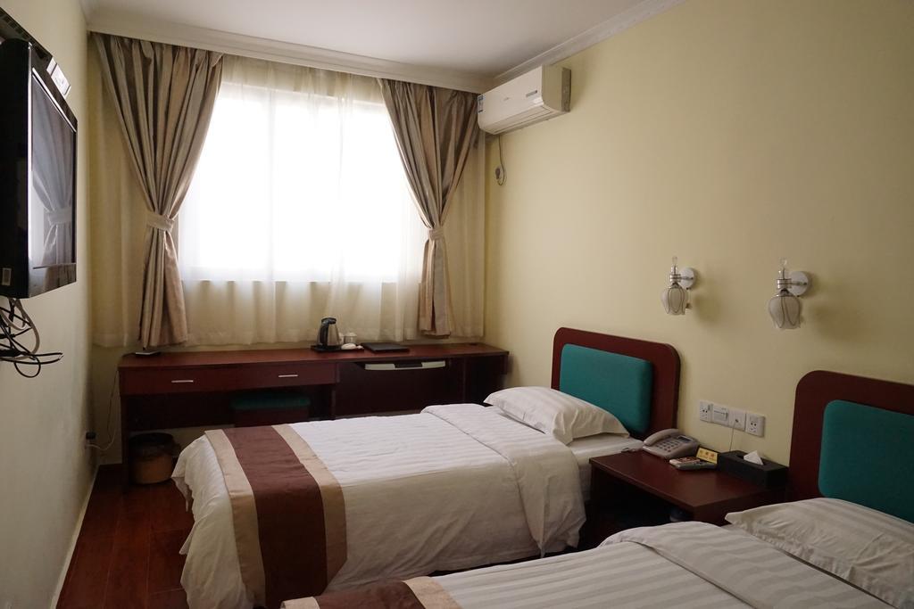 Guangdong Oversea Chinese Hotel Guangzhou Rum bild