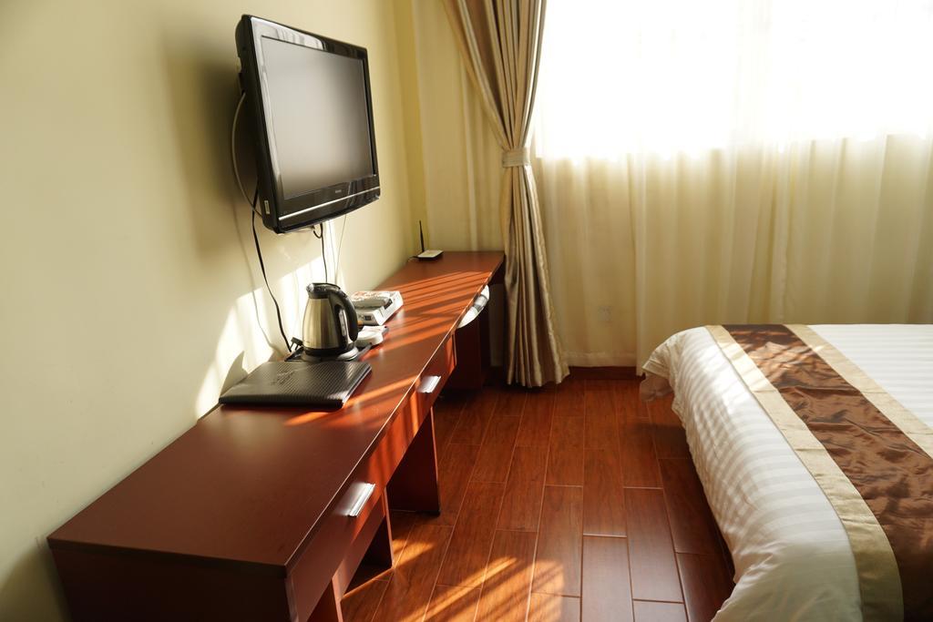 Guangdong Oversea Chinese Hotel Guangzhou Rum bild