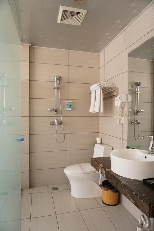 Guangdong Oversea Chinese Hotel Guangzhou Rum bild
