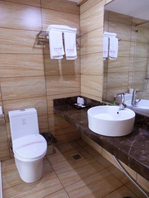 Guangdong Oversea Chinese Hotel Guangzhou Rum bild